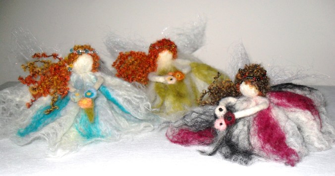 Each Flower Fairy is decorated with a beaded headband and carries a posy.