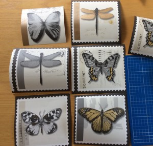 Butterflies and dragonflies cut out from Farfella wallpaper from B&Q