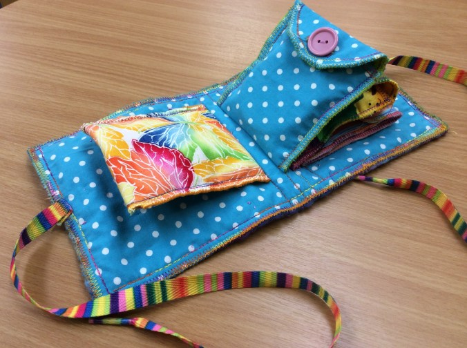 Bright, multicoloured kiddies pocket book.