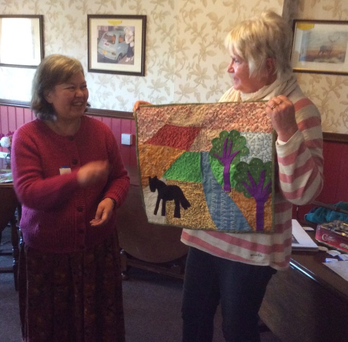 Molly and her quilt.