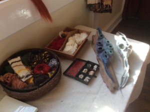 Two examples of Jenny's work displayed with the shells which were her inspiration.
