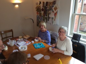 Two ladies trying out needle felting