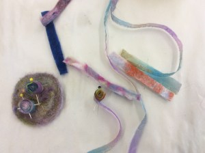 Combining the silk and felt to make the tiny flowers