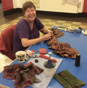 Annemie demonstrates how to make felt "with patience and love".