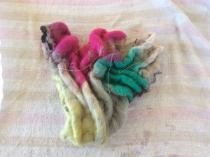 Pleats are sewn into the prefelt before completing the felting & fulling.